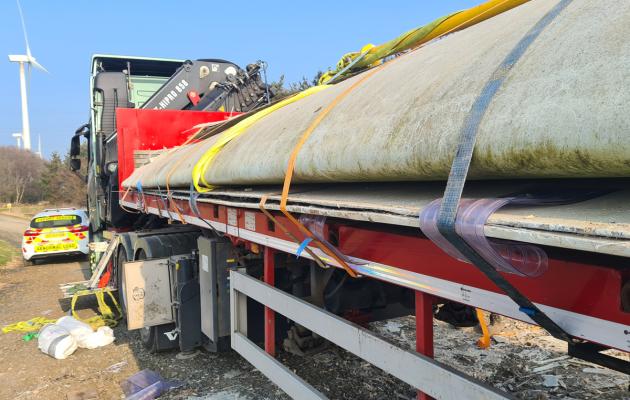 Decommissioned wind turbine blades being transported